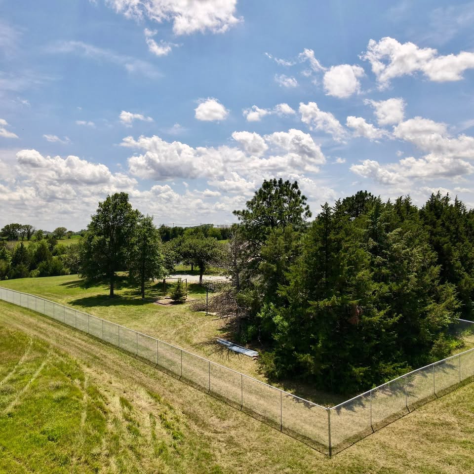 Chain link fence along a rural Southeast Nebraska property line installed by KD Fencing