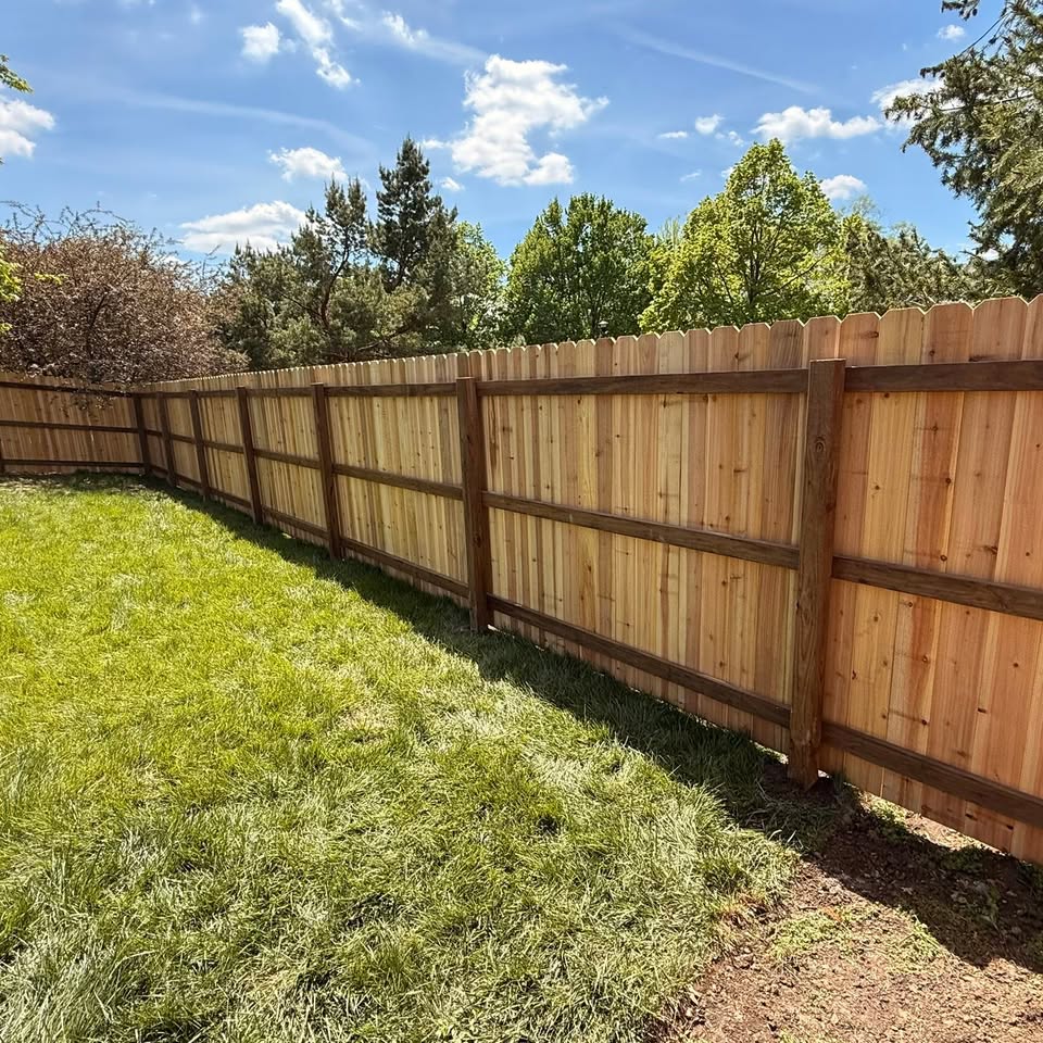 Finished cedar privacy fence installation in Southeast Nebraska by KD Fencing